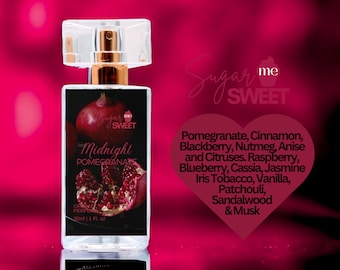 May include: A rectangular perfume bottle with a clear cap and gold-colored accents. The label features a pomegranate illustration and the words "Midnight Pomegranate." The bottle contains 30ml / 1 fl oz of perfume. The background is a gradient of pink and black.