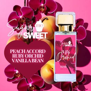 May include: A perfume bottle with a gold cap and a pink label featuring the words "Sugar Me Sweet Ruby Orchid". The image includes peaches, ruby orchids, and the text "Peach Accord, Ruby Orchid, Vanilla Bean". The bottle contains 30ml (1.7 fl oz) of organic perfume.