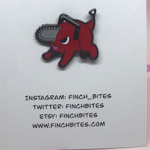 Chainsaw dog enamel pin
