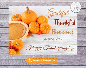 May include: A printable Thanksgiving card with a white background and a woodgrain texture. The card features a pumpkin pie, pumpkins, and fall leaves. The text on the card reads "Grateful Thankful Blessed because of you Happy Thanksgiving!" and "Instant Download".