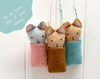 A mini lucky cat in its handmade bundle, one of your choice, made of cotton and felt.
