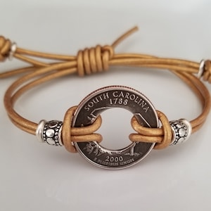 State coin bracelet 2025