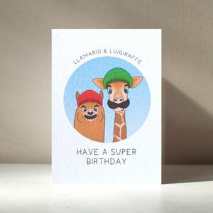 Biglietto d'auguri personalizzato "Llamario & Luigiraffe" in formato A6 con lama, giraffa e baffi, super divertente, per anniversario, compleanno e amore - Benefici di beneficenza
