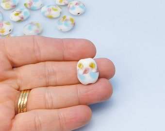 White Fused Glass beads with flowers15mm Oval shaped Beads with 2mm hole (18 Beads)