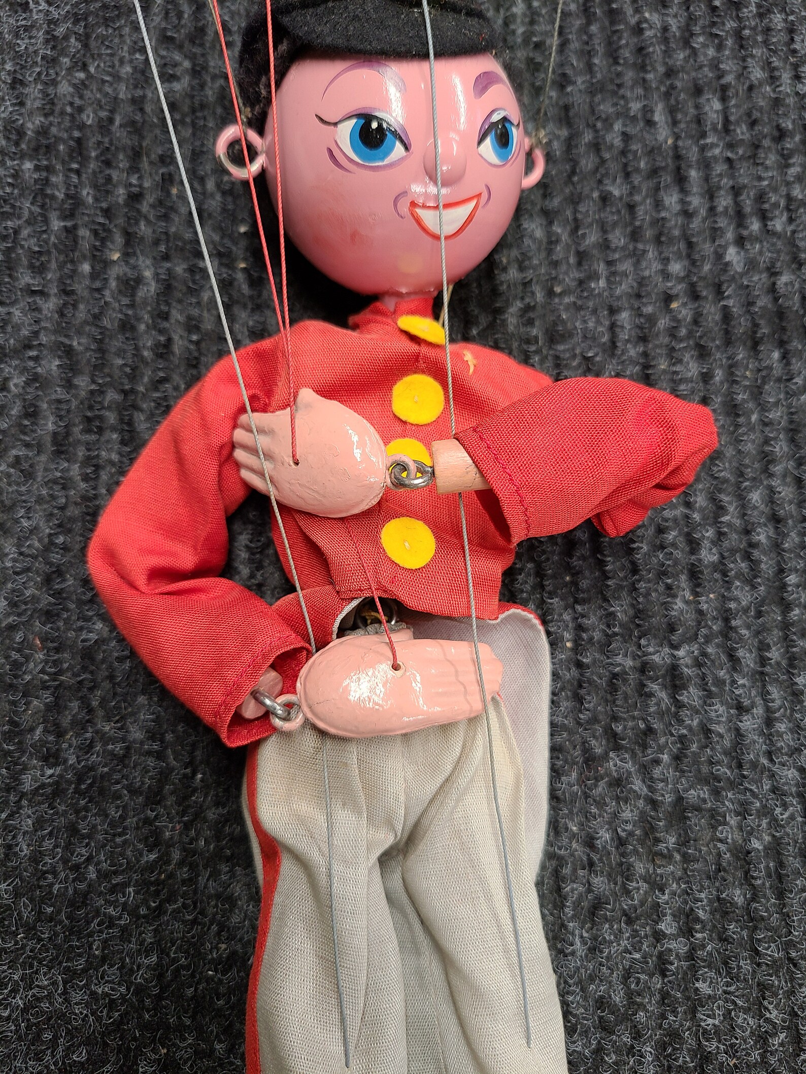 Four Pelham puppets, together with a Pelham puppet theatre - Mitzi, Fritzi, etc