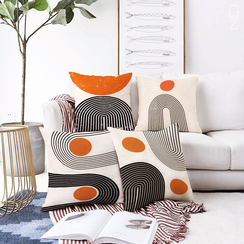 Abstract Ivory Cushion Cover Designs with Orange & Black Geometric Patterns | Double Sided Printing on the Suede with Different Sizes