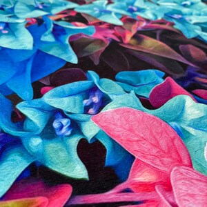 May include: Close-up of a vibrant floral pattern with blue, pink, and purple flowers. The flowers have a textured, painted look, creating a unique and artistic design.