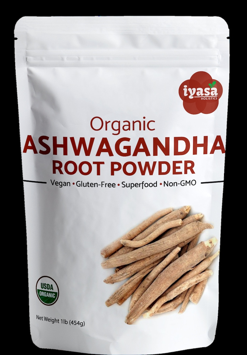 May include: A white resealable pouch with a red and white label. The label reads "Organic Ashwagandha Root Powder" and "Vegan. Gluten-Free. Superfood. Non-GMO". The pouch also features a USDA Organic seal and a red logo with the text "iyasa HOLISTICS". The pouch contains a 1lb (454g) bag of organic ashwagandha root powder.