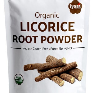 May include: A white resealable pouch with a brown label that reads "Organic Licorice Root Powder". The label also includes the text "Vegan Gluten-Free Pure Non-GMO" and a USDA Organic seal. The pouch contains dried licorice root pieces and has a net weight of 4 oz (113 g).