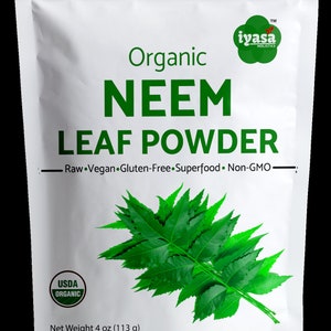 May include: A white pouch of organic neem leaf powder. The package features green text that reads "Organic NEEM LEAF POWDER" and includes the words "Raw, Vegan, Gluten-Free, Superfood, Non-GMO." The package also displays a USDA Organic seal and a net weight of 4 oz (113 g).