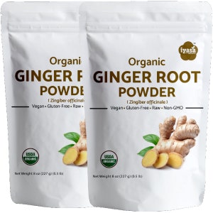 May include: Two white pouches of organic ginger root powder. Each pouch has a USDA Organic seal and a net weight of 8 ounces (227 grams). The pouches feature a close-up image of fresh ginger root.