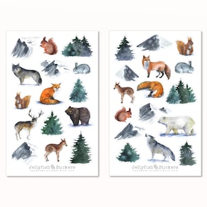 May include: Two sheets of watercolour stickers featuring woodland animals and mountain scenery. The stickers include a wolf, fox, bear, deer, squirrel, rabbit, and evergreen trees. The text "Jellyfish Stickers" is at the bottom.