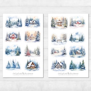 Könnte beinhalten: Zwei Bögen mit winterlichen Aufklebern mit Aquarellillustrationen von verschneiten Landschaften. Jeder Aufkleber zeigt Hütten, Bäume und Winterszenen in Blau, Weiß und Braun. Der Text "Jellyfish Stickers" ist sichtbar.