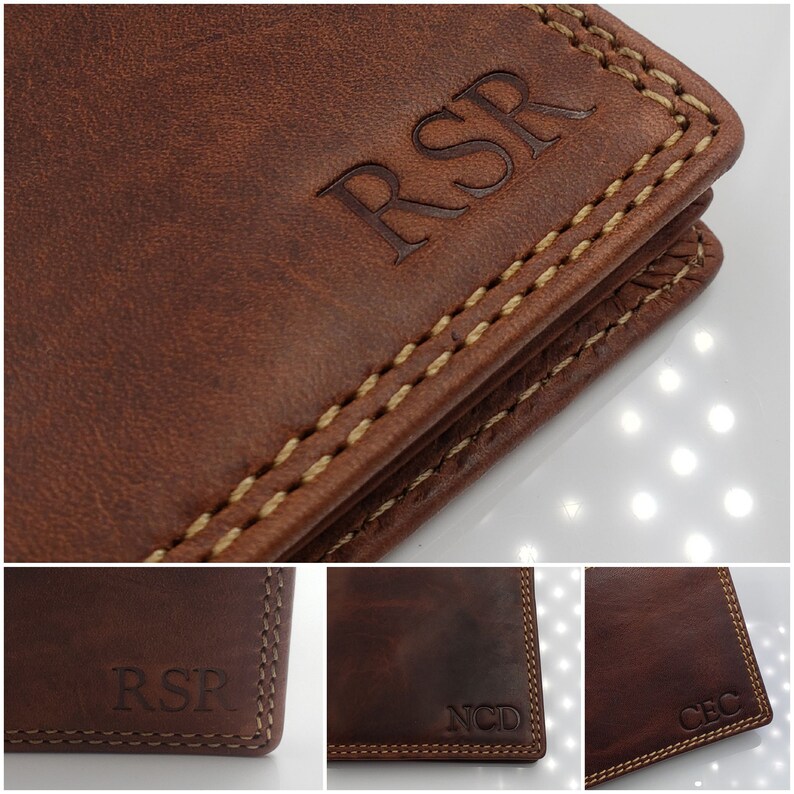 May include: Close-up of a brown leather wallet with a stitched edge. The wallet is personalized with the initials "RSR" in a gold color.