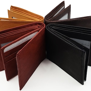 Cartera AG Wallets para hombre con 3 documentos de identidad, fabricada en piel de vacuno, tarjetero plegable y doble solapa central.