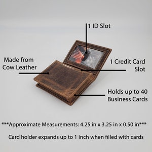 May include: A brown leather card holder with a window for an ID card. It has one credit card slot and can hold up to 40 business cards. The card holder measures 4.25 inches by 3.25 inches by 0.50 inches. The card holder expands up to 1 inch when filled with cards.