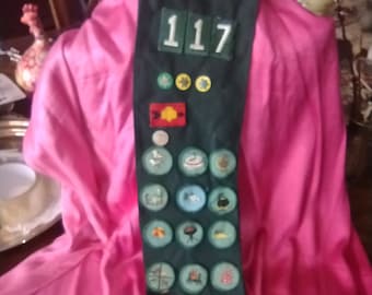 Vintage Girl Scouts Sash with pinned stars and patches