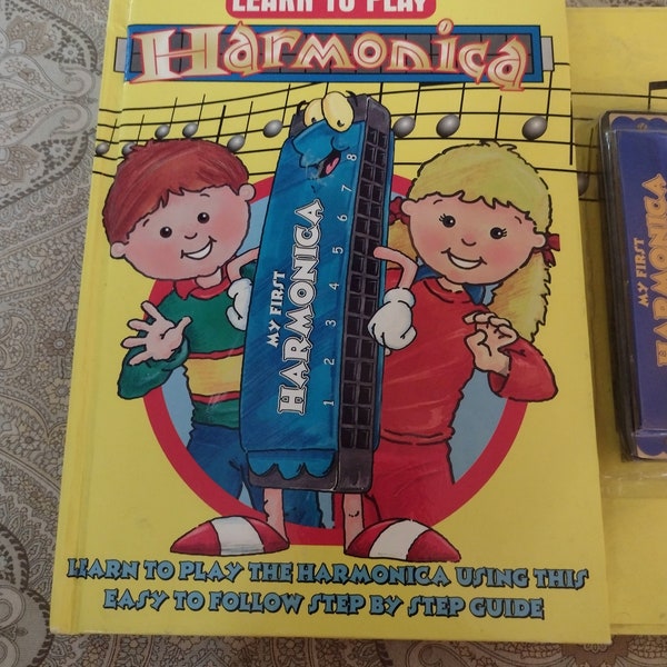 Vintage Learn to play the Harmonica Children's Book with a Harmonica