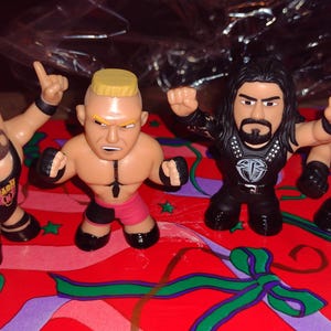 WWE Funko Mystery Minis Wrestling Set: Brock Lesnar, Undertaker, Reigns, Nash