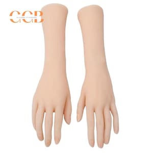 May include: Two realistic-looking, flesh-toned, mannequin hands with long, slender fingers. The hands are posed with palms facing up and fingers slightly spread apart.