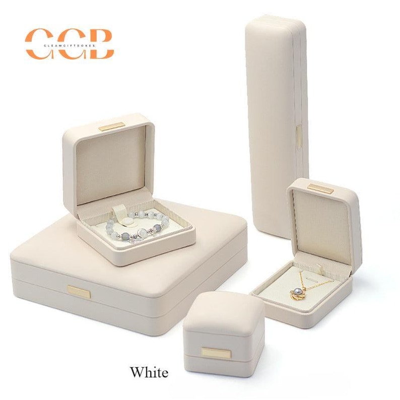 Kundenspezifische Premium-Luxus-Schmuckschatulle aus Lavendel und weißem Leder, Schmuckset, Mikrofaserfutter, Schmuckverpackung, Armband- und Halskettenbox Bild 1