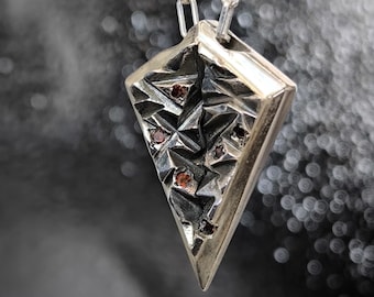 Brutalist Silver Pendant — Raw textured 925 with garnets
