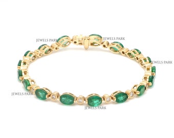 Real emerald oval cut half bezel set diamond bracelet gold | Natural emerald oval diamond tennis bracelet gold | Emerald oval bracelet gold
