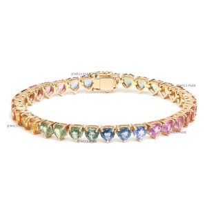 Rainbow sapphire heart bracelet gold | Natural rainbow sapphire bracelet with heart charm | Multi colored sapphire heart bracelet gold