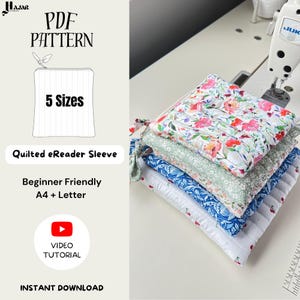 May include: A stack of four quilted eReader sleeves featuring floral and cherry patterns in pink, green, blue, and white. The text on the left reads PDF PATTERN, 5 Sizes, Quilted eReader Sleeve, Beginner Friendly, A4 + Letter, and VIDEO TUTORIAL.