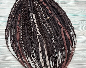 Brown synthetic dreadlocks with brown, white, and beige crocheted lace accents and silver and white beads.