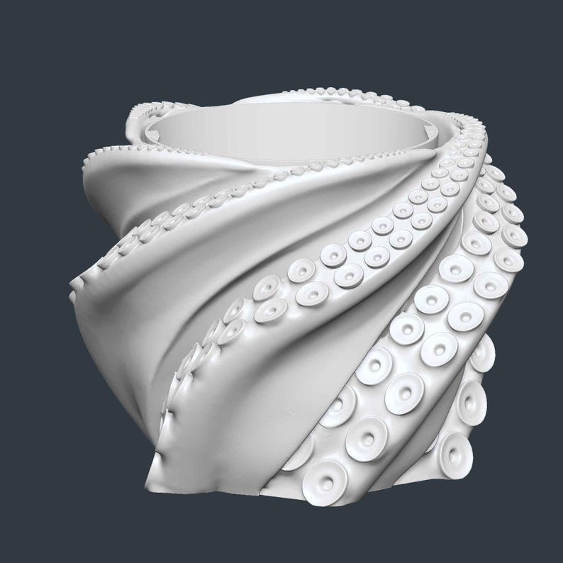 May include: A white, stylized octopus-tentacle-shaped container. The design features swirling, textured forms with numerous circular suckers along the edges, creating a unique and artistic appearance. The container is set against a dark gray background.
