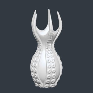 May include: A white, abstract sculpture resembling an octopus. The sculpture has a vase-like shape with multiple tentacle-like arms extending upwards. The surface is covered in small, circular suction cup details, adding texture and visual interest.