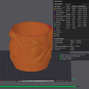 May include: A 3D-printed orange plant pot with a textured, organic design. The pot has a wide opening and a detailed surface, with visible layers from the printing process. The object name is "eye-surrealism-plant-pot.stl" and the size is 14.56 x 14.7 x 12.91 cm.