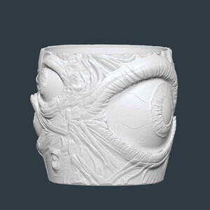 May include: A white, cylindrical planter with a detailed, textured design featuring large, stylized eyes and organic, vein-like patterns. The planter has a wide opening and a smooth rim, suitable for indoor or outdoor use.