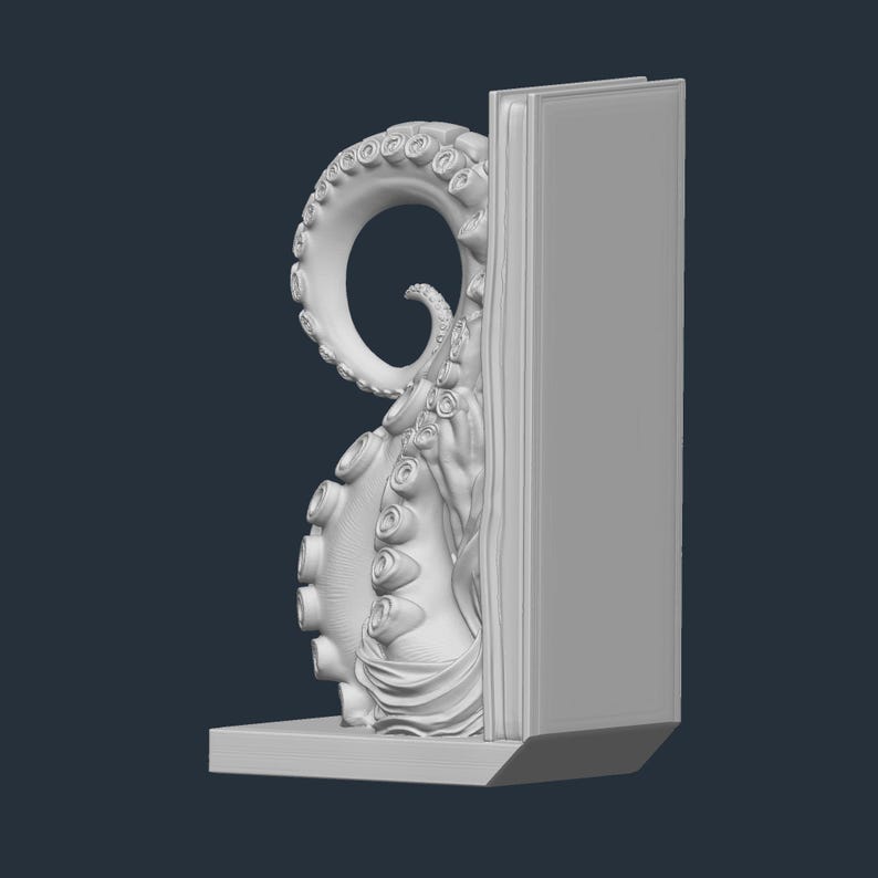 May include: A white octopus tentacle bookend. The tentacle curves around a rectangular book support. The bookend is designed to hold books upright on a shelf. The design is a detailed sculpture of an octopus tentacle.