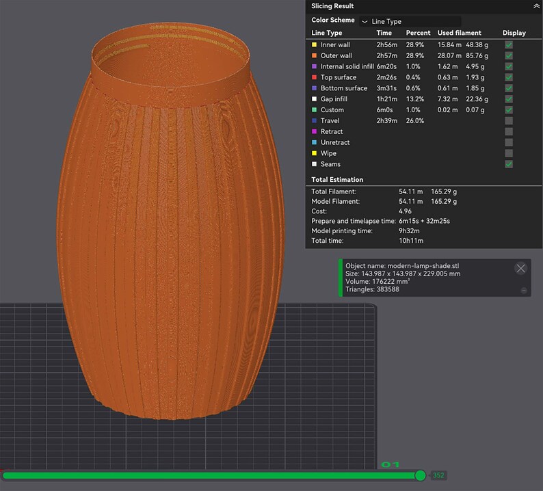 May include: A 3D-printed, orange-brown lamp shade with a vertical wood grain pattern. The cylindrical shade has a wide base and a slightly narrower top. The image also shows slicing information, including dimensions of 5.67 x 5.67 x 9.02 inches.