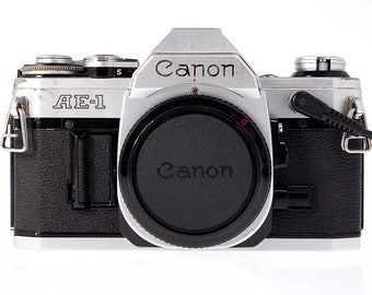 CANON AE-1 SLR 35mm Film Camera w/ Canon Data Back A in Good Condition