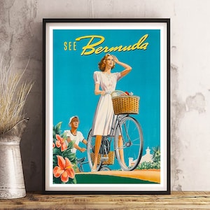 May include: A vintage travel poster advertising a trip to Bermuda. The poster features a woman in a white dress riding a bicycle with a basket on the handlebars. The woman is looking out at the ocean. The poster also features a man in a white shirt and a straw hat riding a bicycle in the background. The poster is set against a blue sky and a green landscape. The text on the poster reads "See Bermuda".