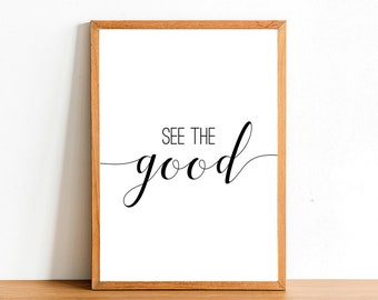 May include: A framed print with a white background and black text that reads "See the good" in a cursive font.