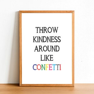 May include: A framed print with the text "Throw kindness around like confetti" in black and white with the word "confetti" in rainbow colours.