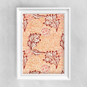 May include: A framed print featuring a repeating pattern of stylised red and white flowers and leaves on a peach background.