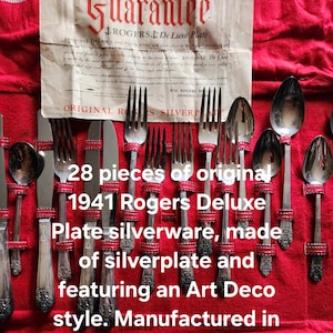 May include: 28-piece set of 1941 Rogers Deluxe Plate silverware. Made of silverplate, the Art Deco style flatware includes forks, knives, and spoons. Manufactured in the United States in 1941.