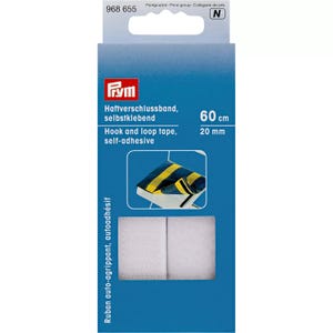 Könnte beinhalten: Eine blaue rechteckige Verpackung mit selbstklebendem Prym Haftverschlussband. Die Verpackung zeigt den Text 968 655, 60 cm und 20 mm. Sie enthält ein Bild eines blau-gelb gestreiften Kissens und zeigt das weiße Band im Inneren.