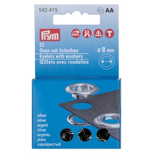 Puede incluir: Una caja de embalaje azul de Prym que contiene 32 ojales metálicos de color plateado con arandelas, cada uno de 8 mm de diámetro. El envase muestra el nombre del producto, la cantidad e iconos que ilustran el proceso de aplicación.