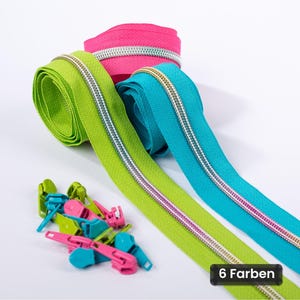 Könnte beinhalten: Drei aufgerollte Endlosreißverschlüsse in Pink, Limettengrün und Türkis, jeweils mit einer silberfarbenen Metallkette. Eine Ansammlung passender Reißverschlussschieber aus Kunststoff in Pink, Grün und Blau liegt daneben. Der Text lautet 6 Farben.