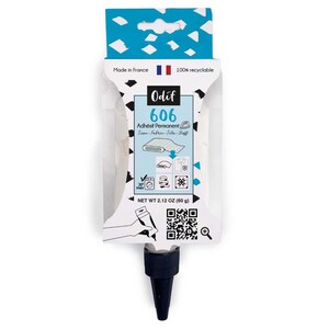Könnte beinhalten: Eine weiße und blaue Odif 606 Sprühkleberflasche für Textilien mit schwarzer Düse. Das Etikett zeigt den Text Odif 606 Adhésif Permanent, einen QR-Code und ein Nettogewicht von 60 g. Die Verpackung enthält Symbole für die Anwendung auf Stoffen.