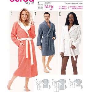 May include: A Burda Style 6740 sewing pattern for a bathing gown. The pattern features three variations: a long coral robe with a white hood and belt, a mid-length blue robe with a shawl collar and belt, and a short white robe with a hood and belt.