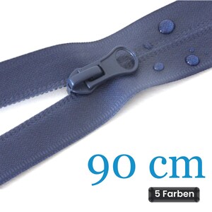 May include: A dark blue zip with a matching pull tab and fabric tape. The zip features water droplets on the surface. The text 90 cm is displayed in blue, and a black rectangular badge contains the white text 5 Farben.