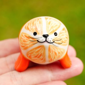 Handmade Ceramic Orange Seal Figurine: Tropical Fruit Decor