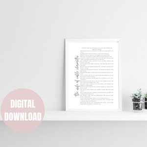 May include: A white framed printable with black text that reads "The role of well character". The text is written in a cursive font and is centered on the page. The printable is on a white shelf with two small potted plants in clear glass containers.